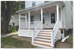 PORCH CONSTRUCTION - We tore down and replaced this old closed in porch with a new Farmer’s Porch in Exeter, NH....