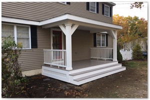PORCH CONSTRUCTION - The farmers porch was constructed with a hip roof, 6x6 support post with angle supports, center bead ceiling, recessed can lighting, slate gray Azek deck boards, white premier Azek railings and white Azek trim for around the posts and skirt.