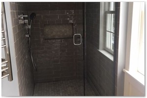 Master bathroom renovation in Exeter. Custom  tiled shower and a stand alone tub.