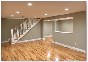 Basement Remodel with hardwood floors and plenty of lighting.