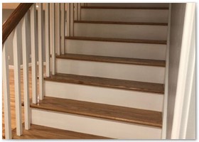 Basement renovation with hardwood stairs